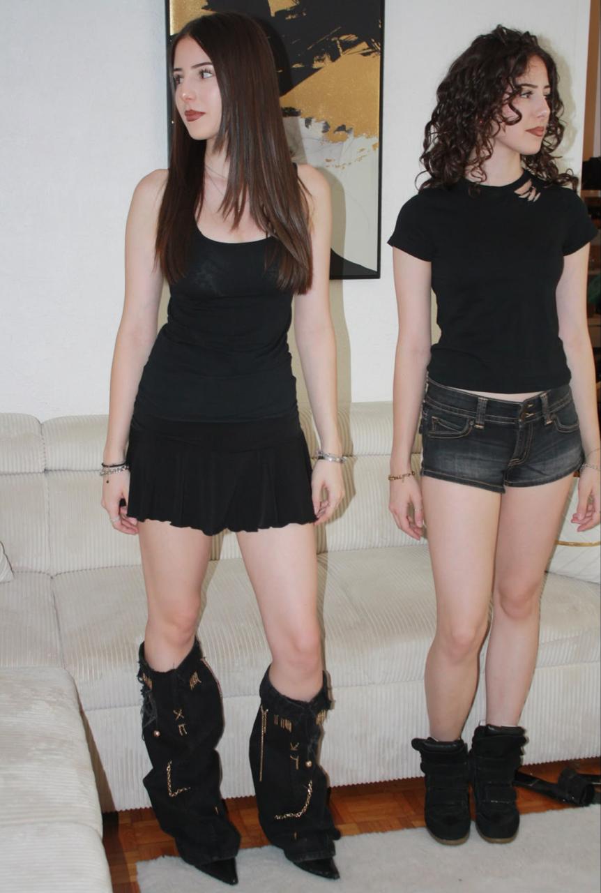 Two friends in black outfits and reworked boots